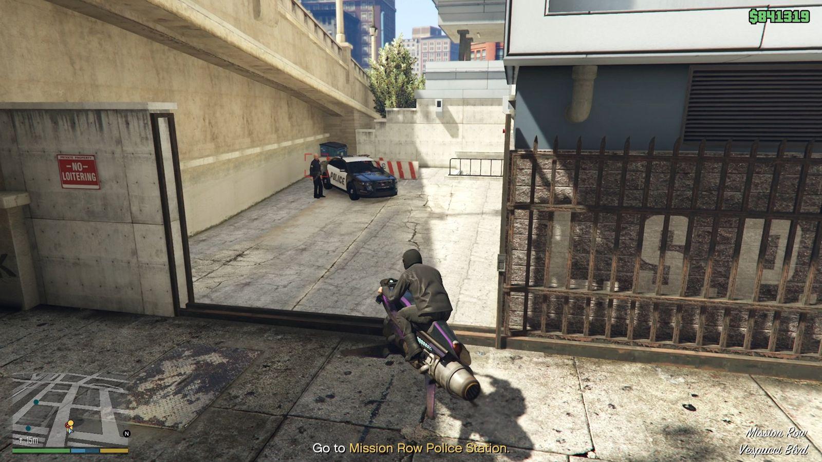 Police officer guarding the back entrance.