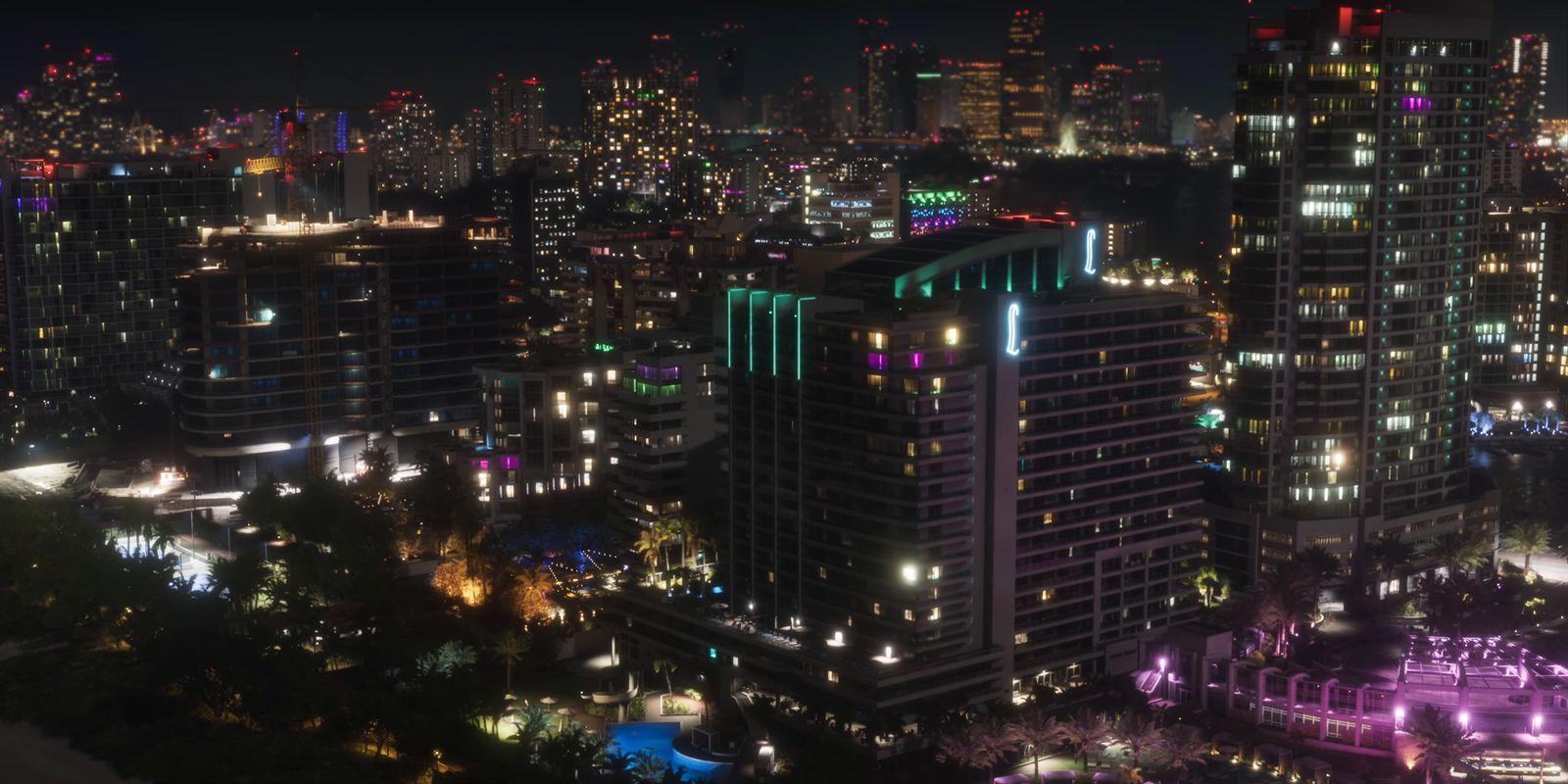 Coloured lights pick out the city’s high-rises at night.