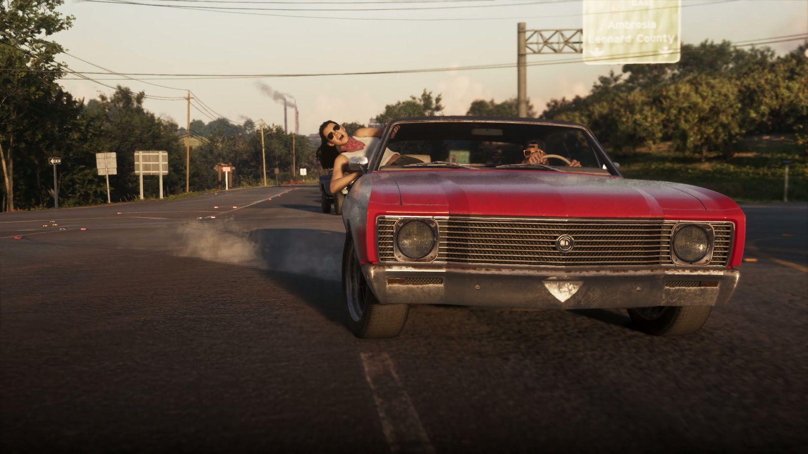 A red lowrider waits outside after the apartment escape.