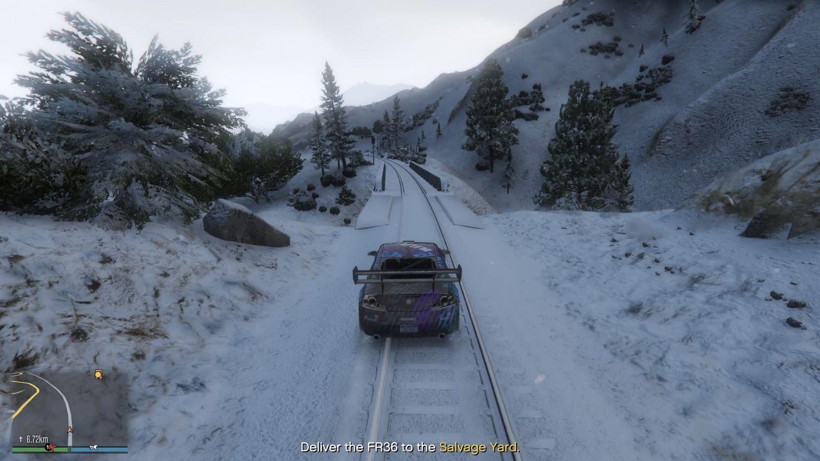 Cross them, and then you can go on the road to your left.