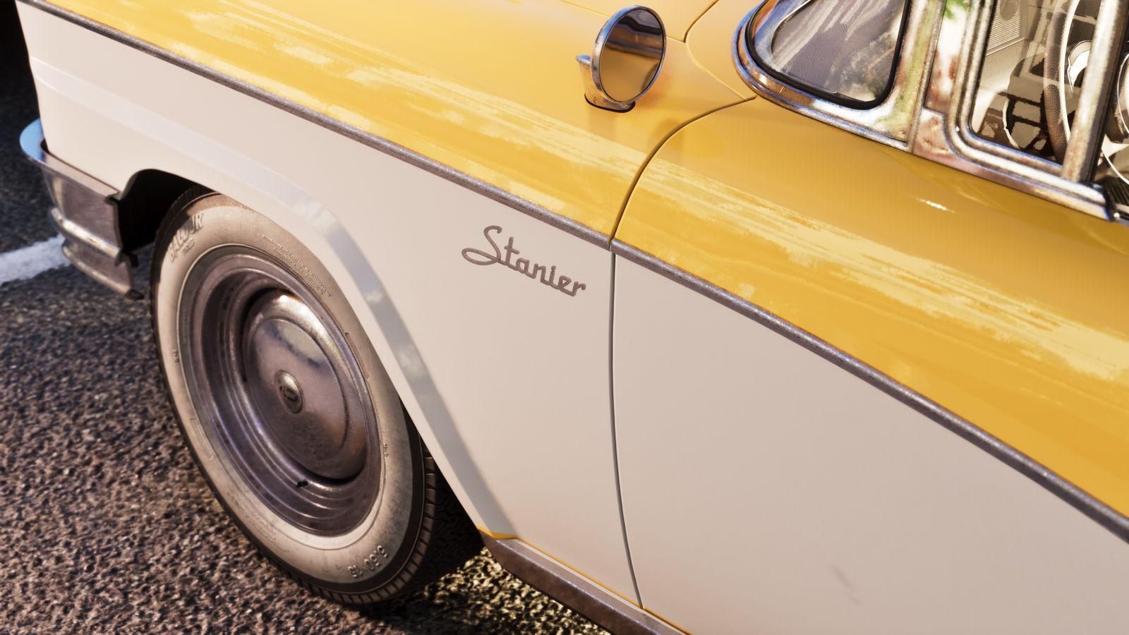 The cursive Stanier badge and two-tone side panels.