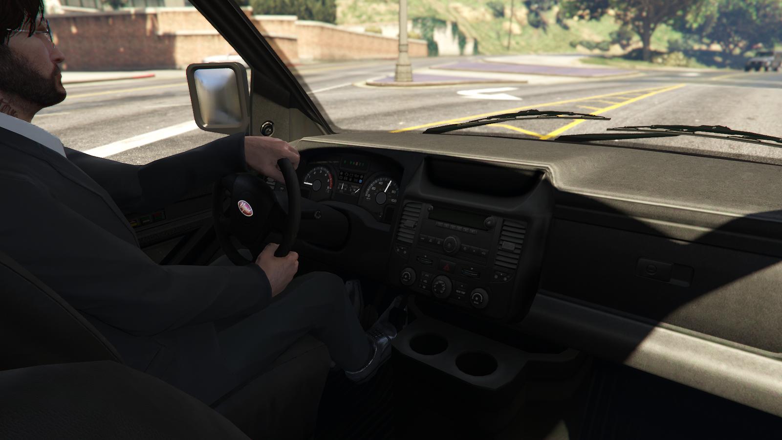 The interior of Vapid Speedo Custom.