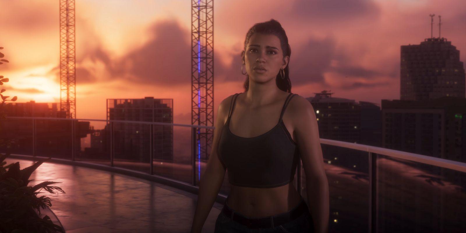 Lucia stands on a rooftop against the orange sunset.