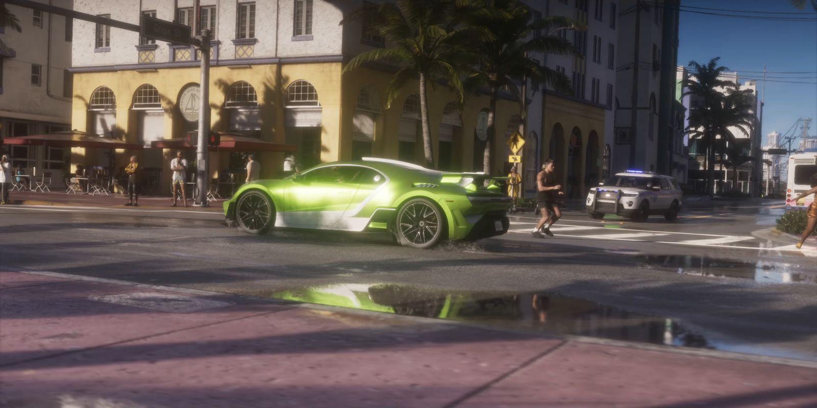 A green sports car crosses a wet intersection with a police SUV behind it.