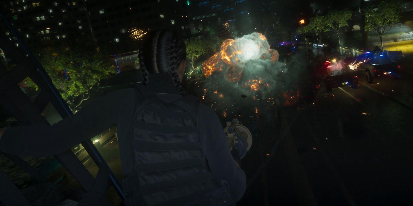 An armed figure overlooks an explosion and police vehicles on the street below.