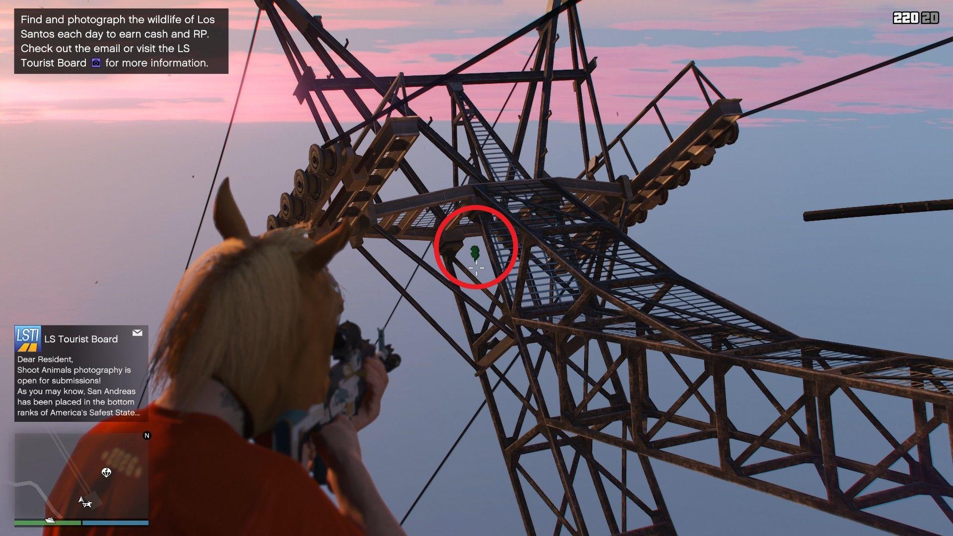 The lucky clover is hanging by the cable car support structure.