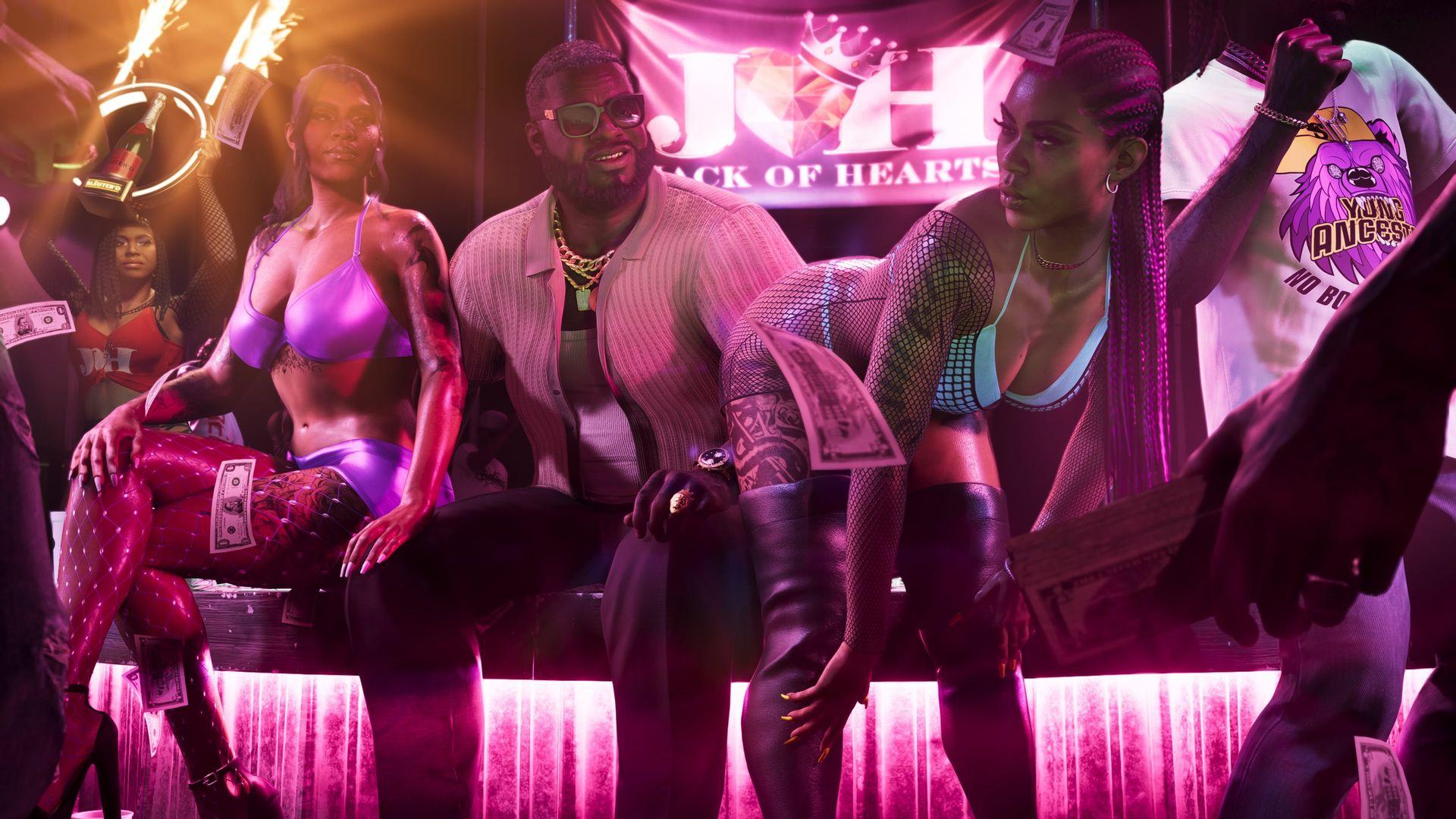 Boobie Ike partying with strippers inside the Jack of Hearts strip club.