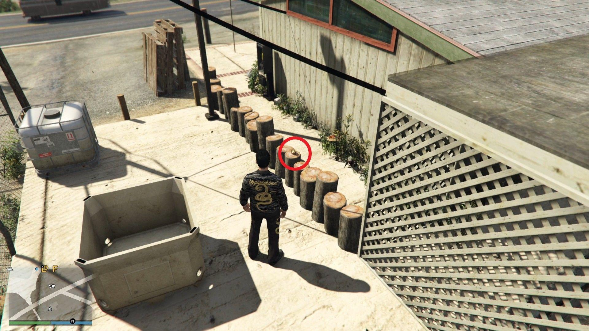 The Yuanbao is on an upright wooden log on the right side of the Alamo Fruit Market.