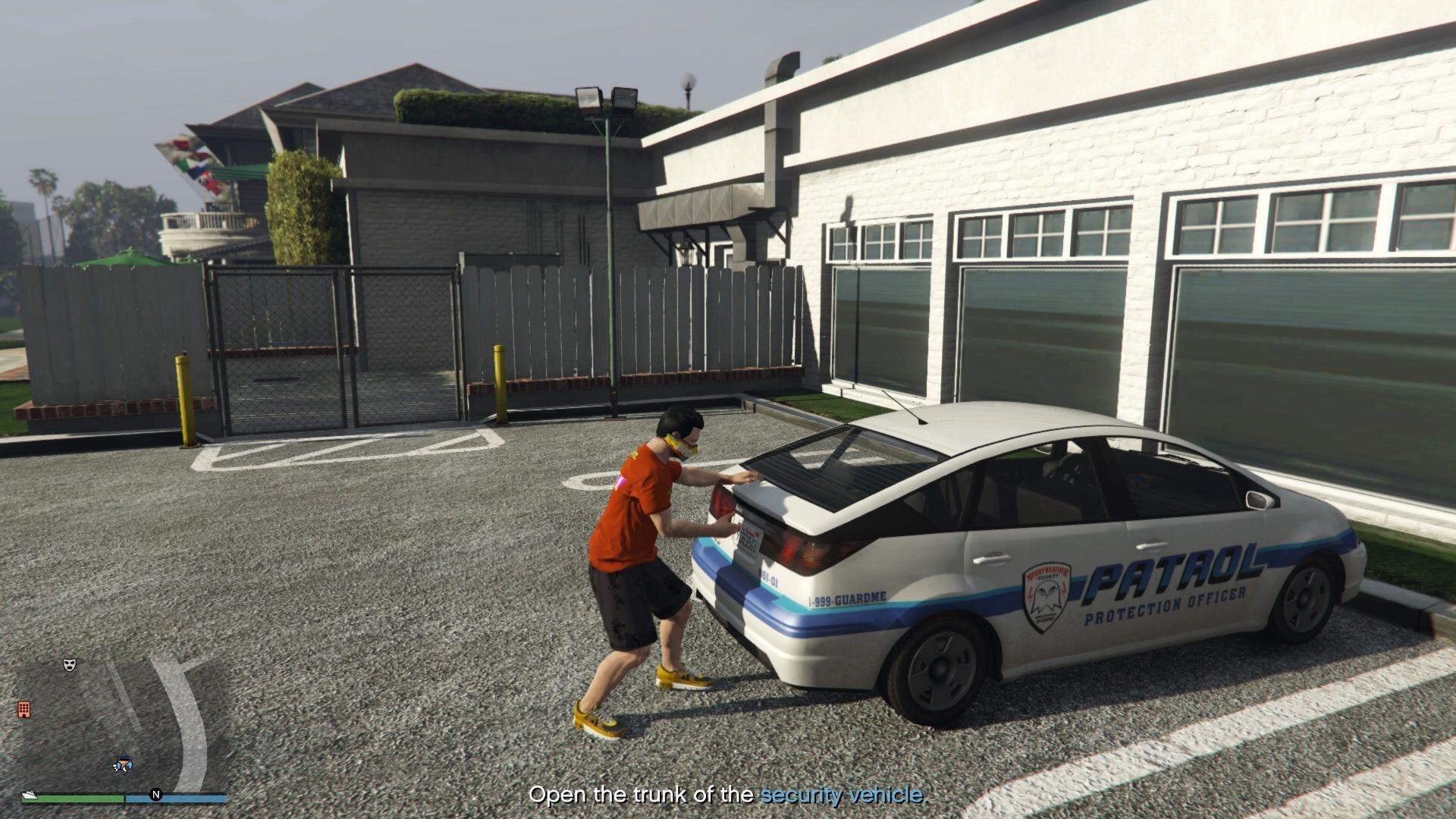 Once located, go to the trunk of the car and open it up to get the stun guns.