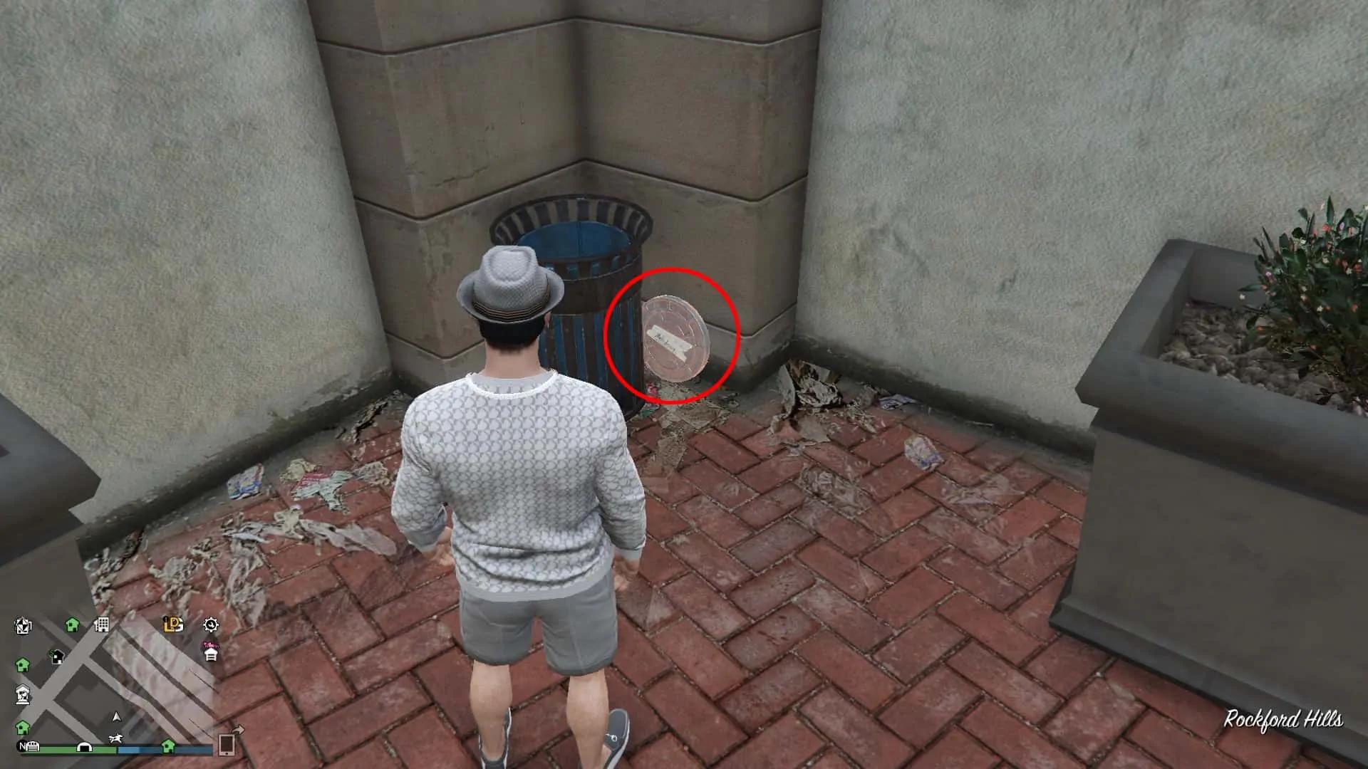 Prop 1 beside the trash bin