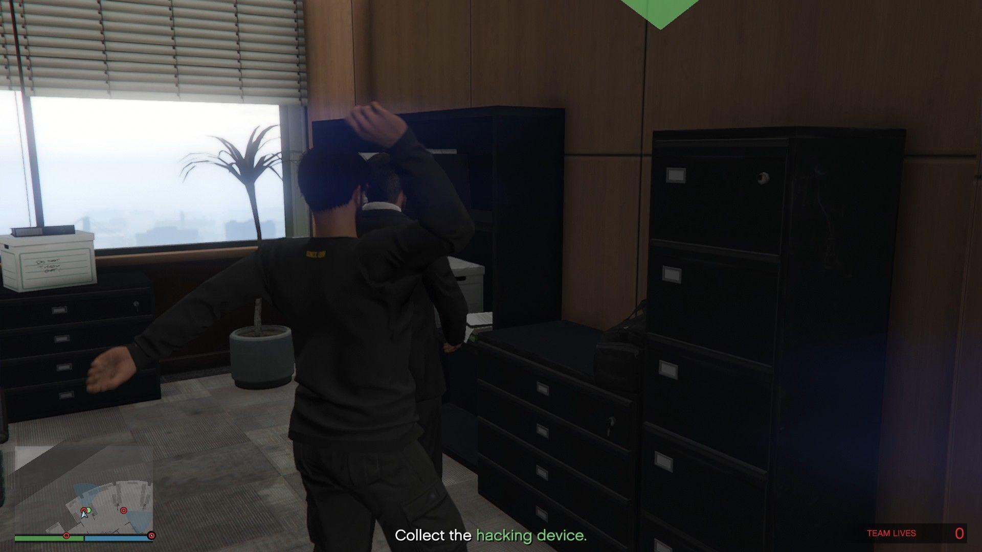 Eliminating the agent guarding our gear and the hacking device.