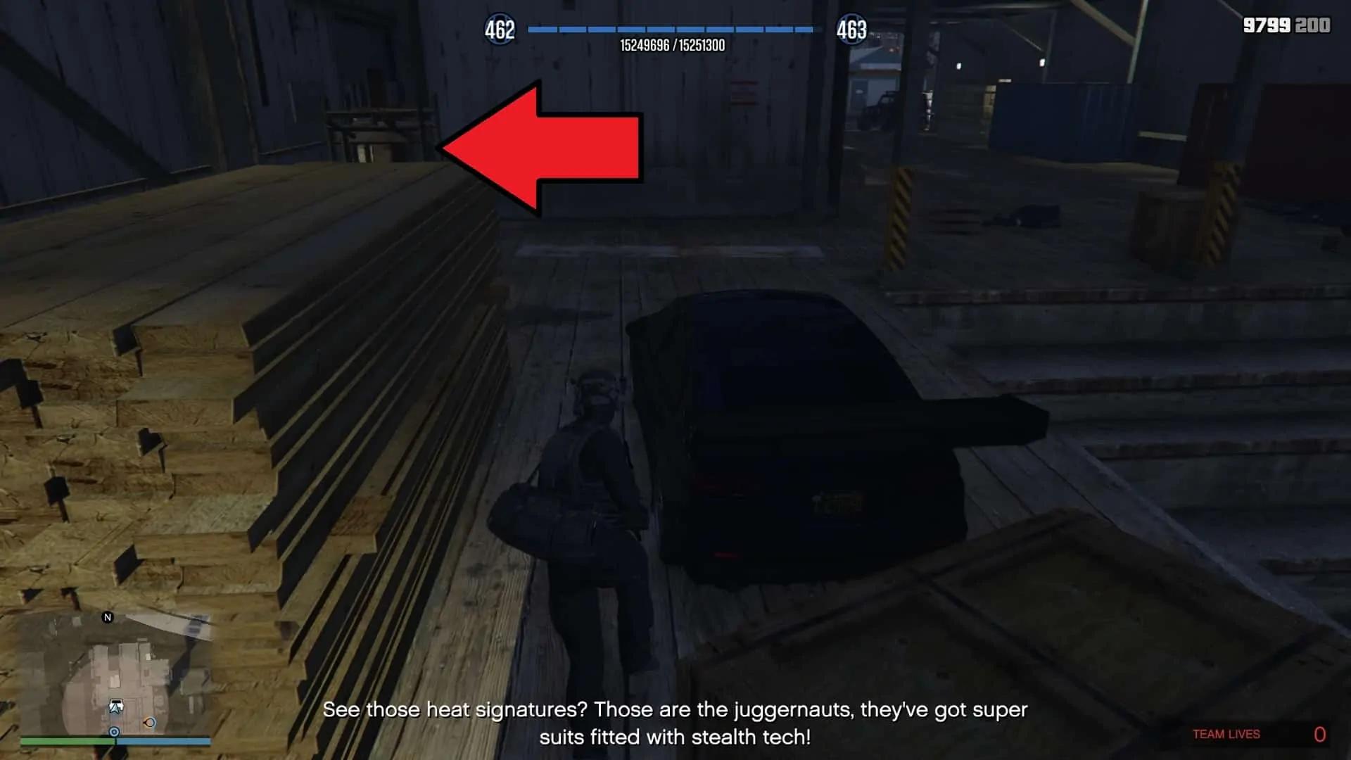 Door to the left past the wooden planks