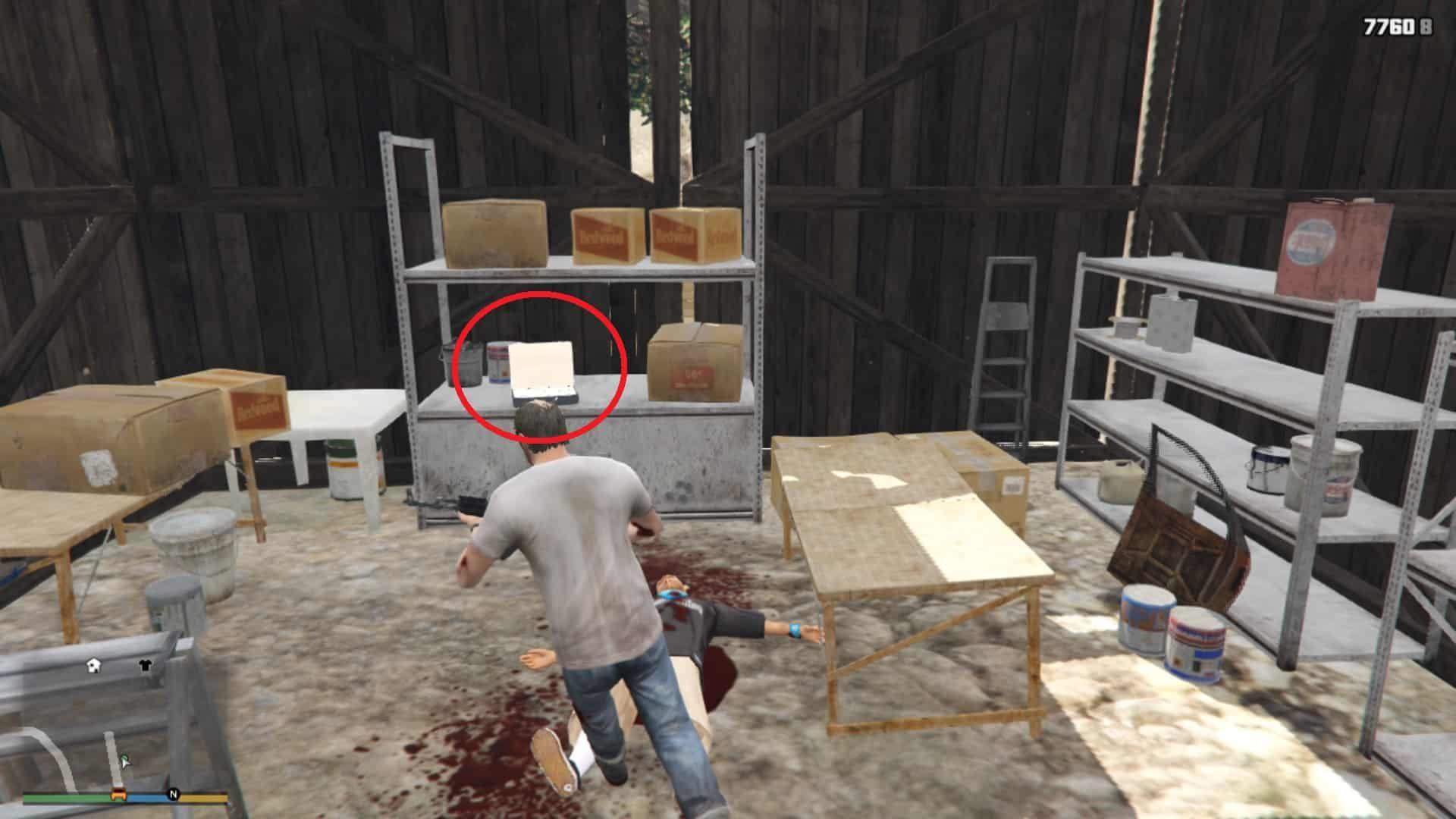 An open briefcase sitting on the shelf containing the cas