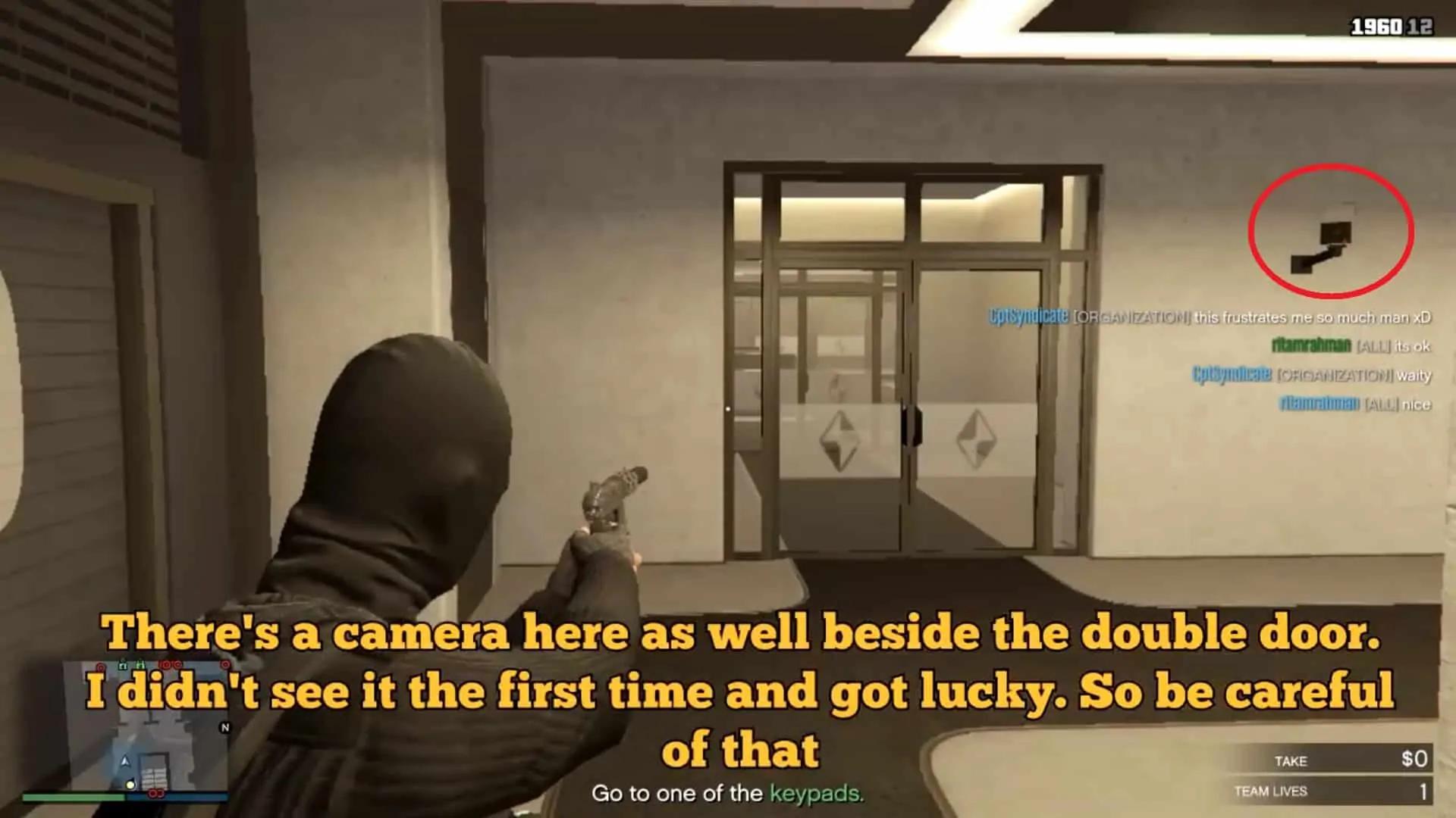 The camera you need to be careful of before entering the double doors ahead