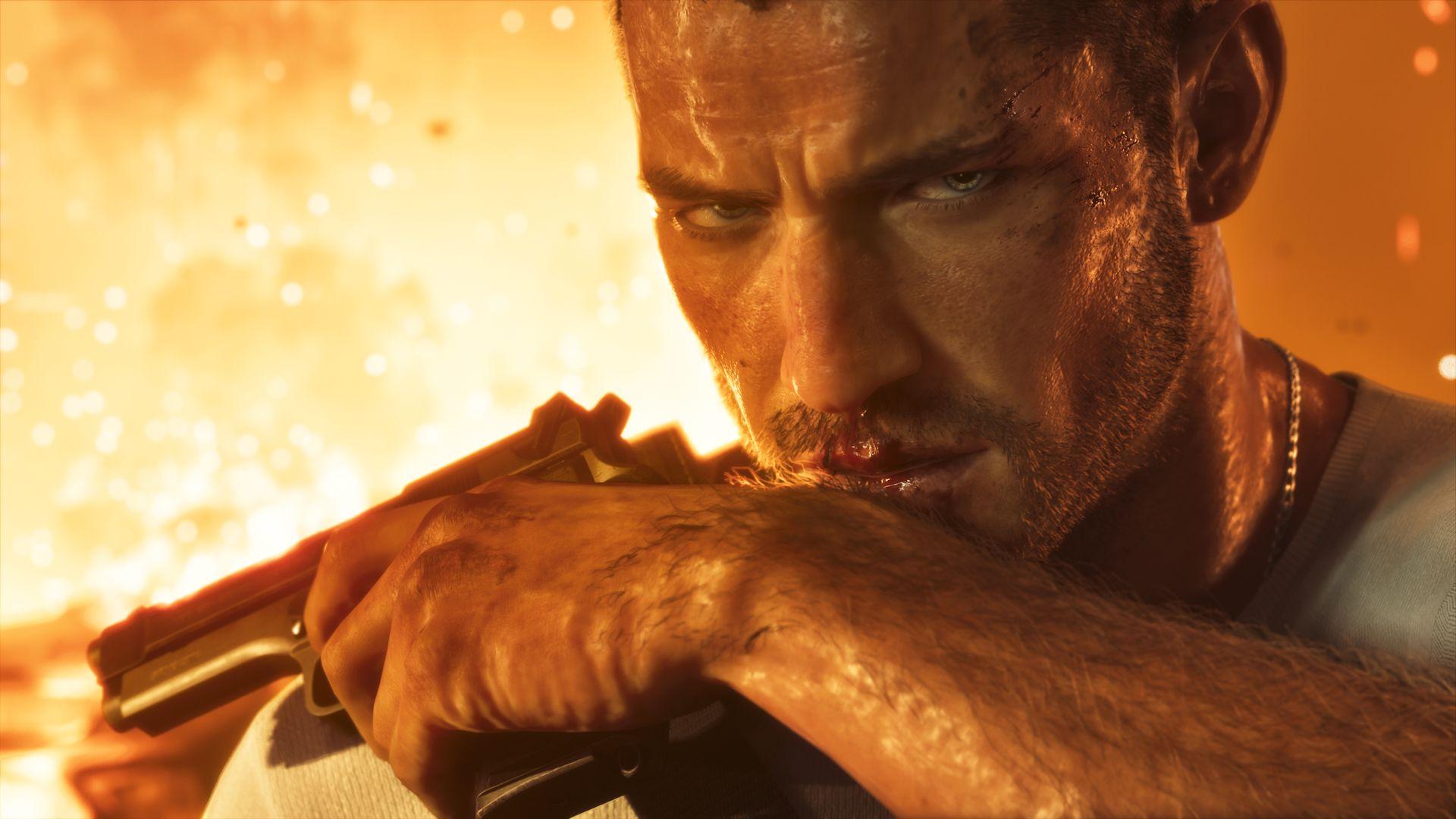 Jason holds a pistol near his bloodied face, with flames behind him.