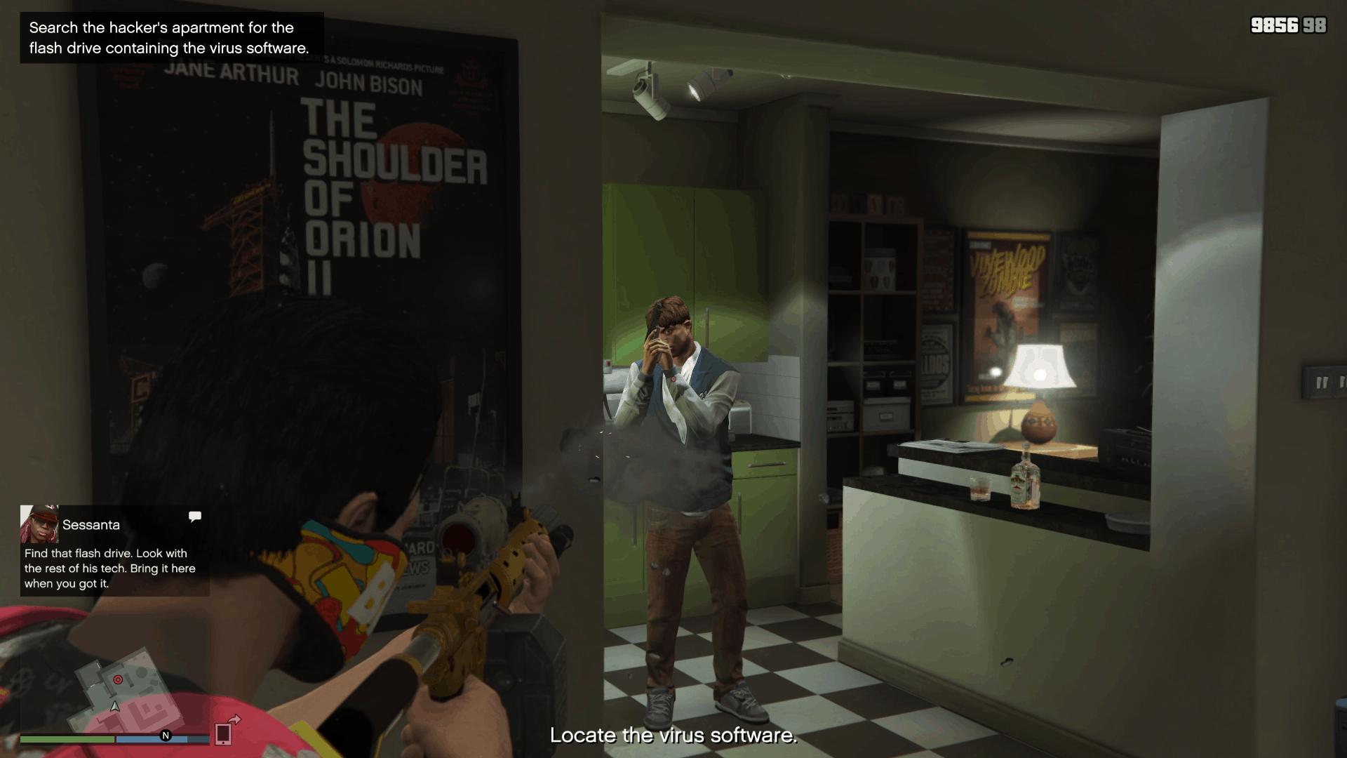 The hacker inside his apartment now armed