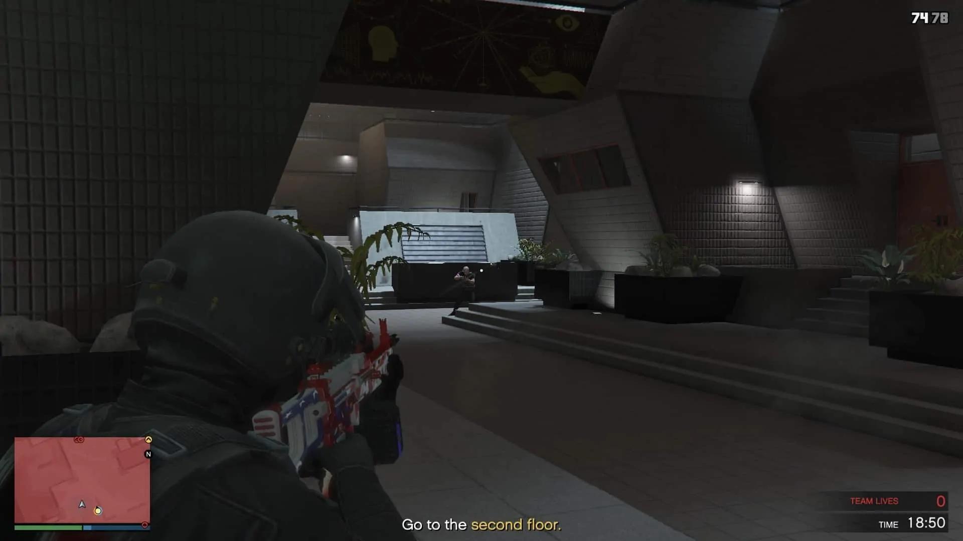 One of the three guys on the left side