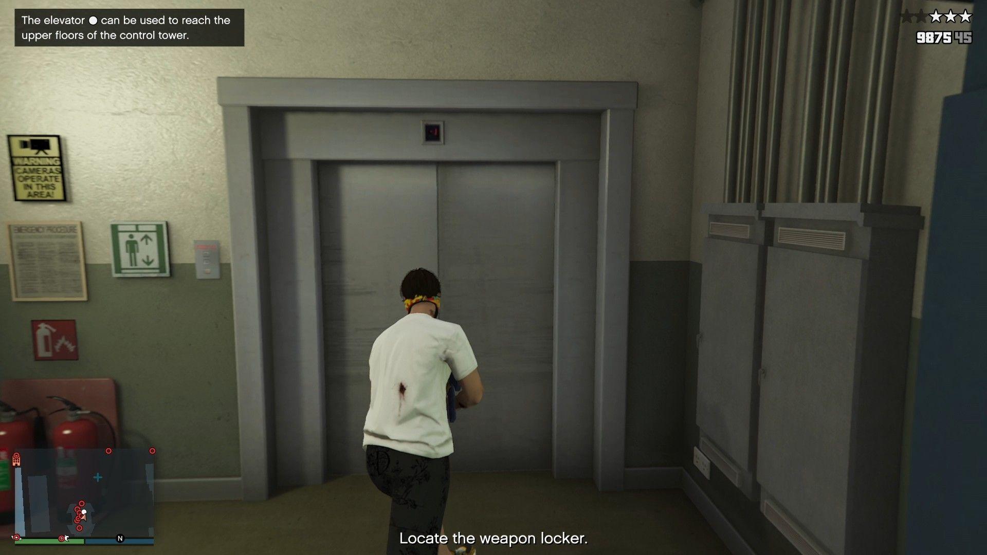 Elevator at the end of the hallway. The elevator doors will open when you get closer.
