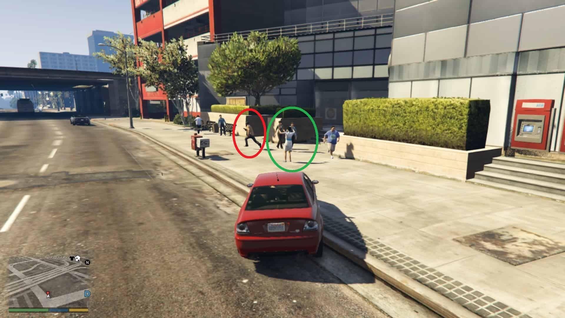 Robber (circled in Red) running away after robbing the lady (circled in Green) who is having her hands up as she was being held at gunpoint prior to the guy running away