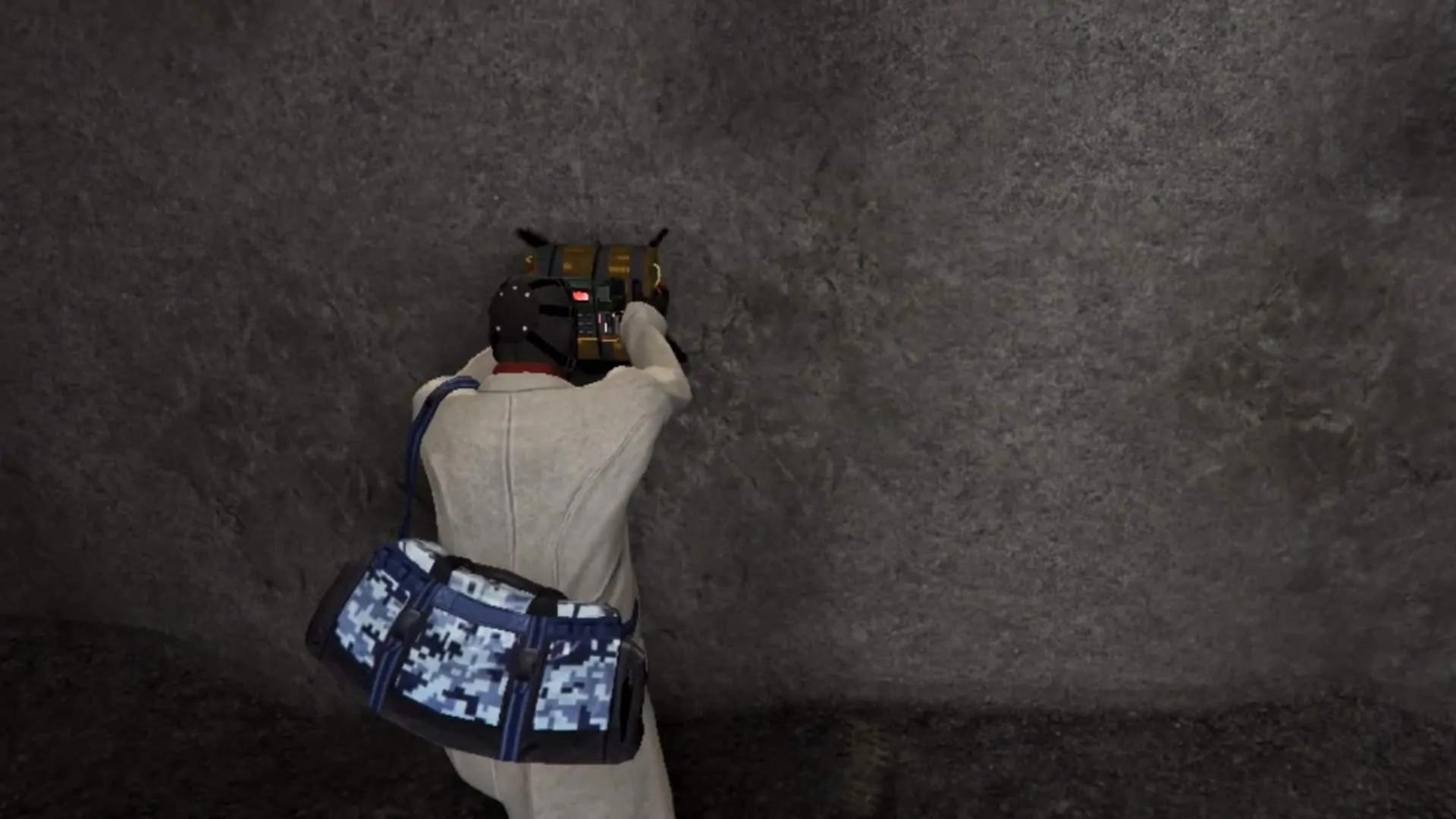 Planting the bomb on the marked wall