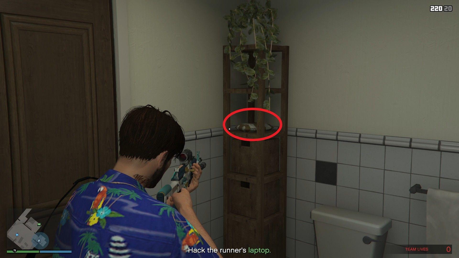 The cocaine is on the wooden shelf inside the bathroom.