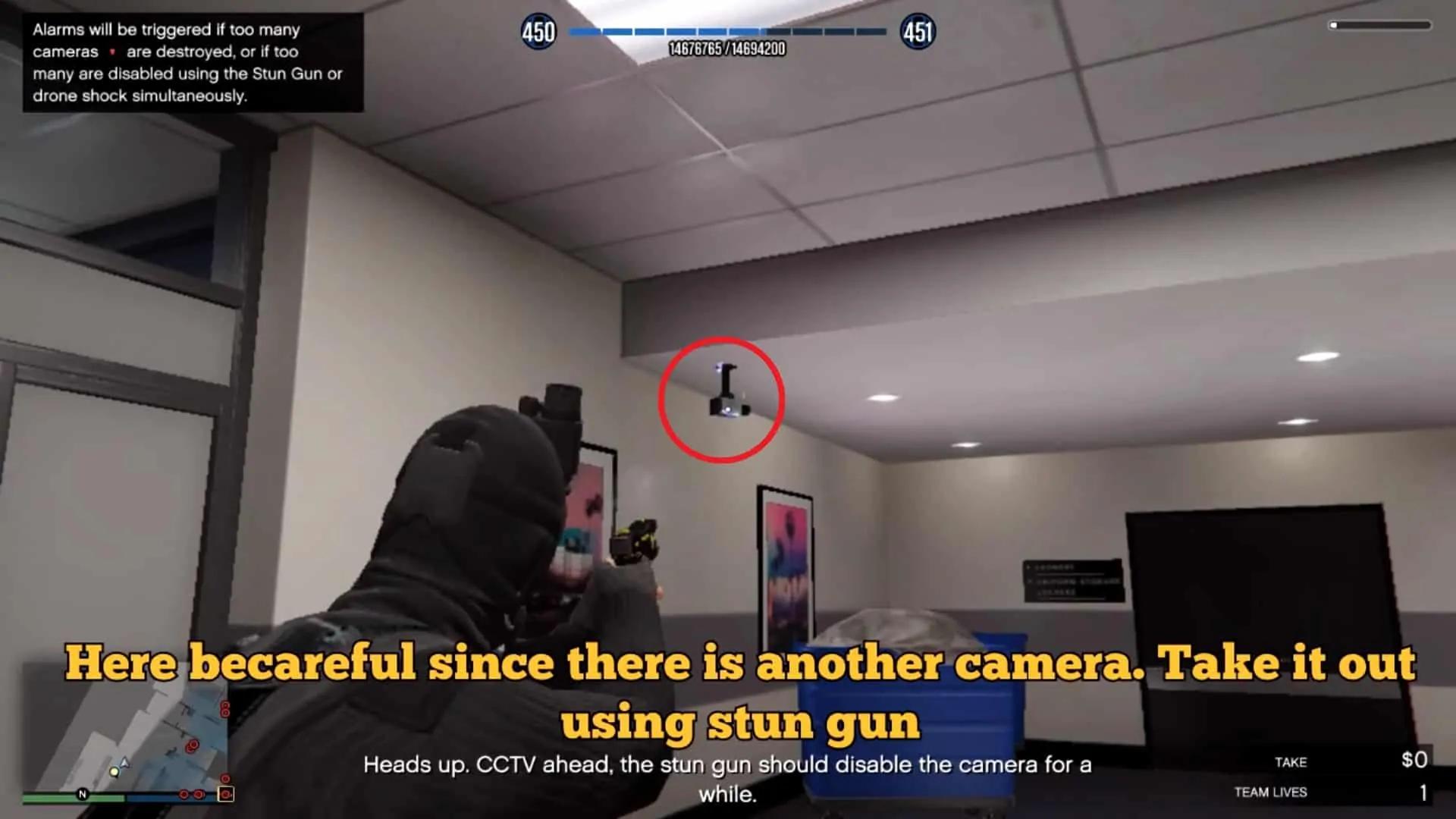 The camera to your left after you go through the metal detector