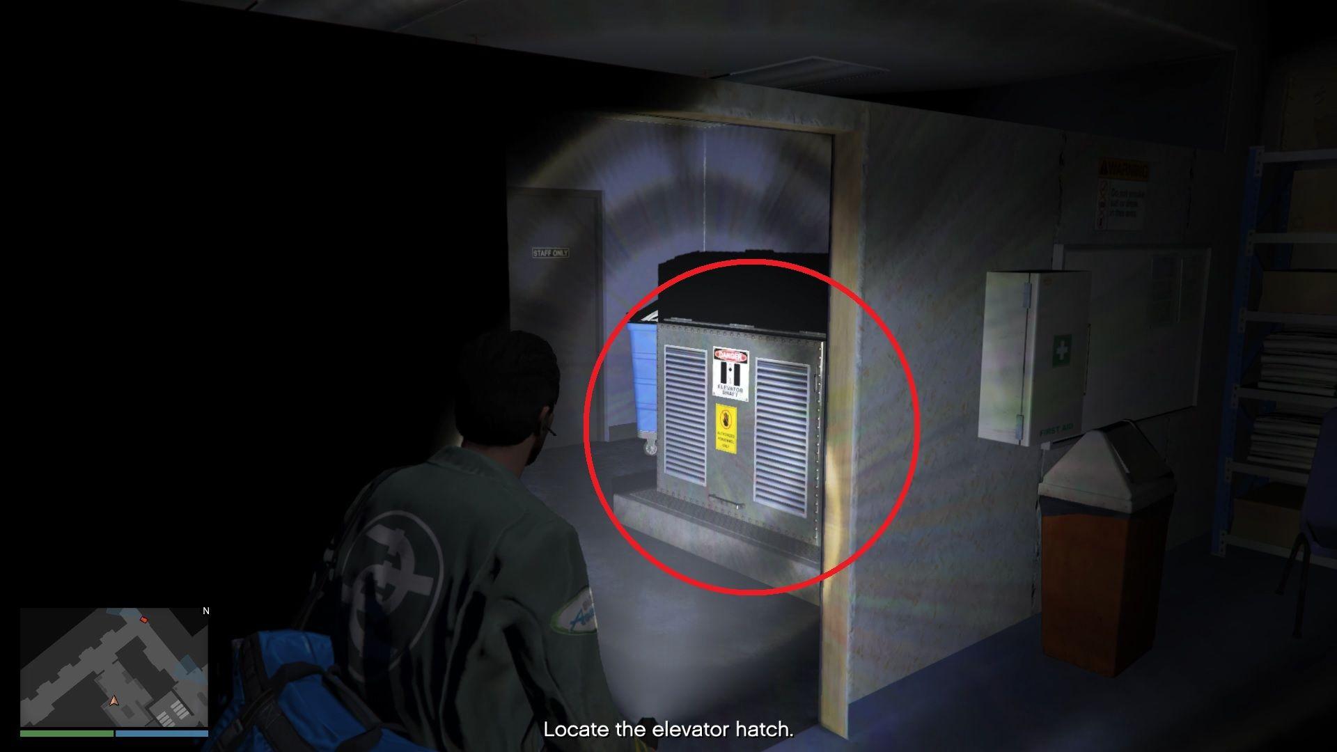 Go through the doorway to find the elevator hatch.