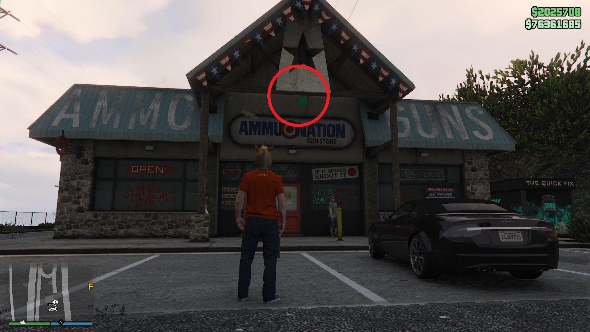 The lucky clover is hanging above the entrance of the Ammu-Nation gun store in the Tataviam Mountains.