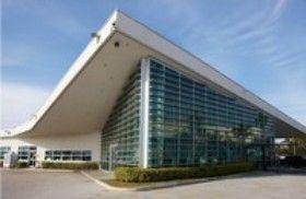 Signature Flight Support's Miami terminal has the same overhanging roof and curved glazing.