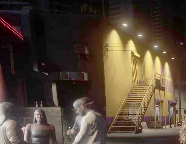 Vice City Pawn combines a yellow wall, blue signage and a side staircase.