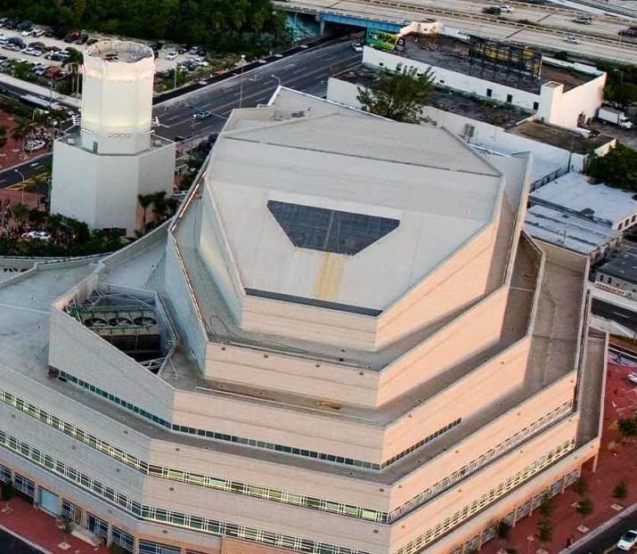 Miami's Adrienne Arsht Center, showing the same low, faceted roofline.