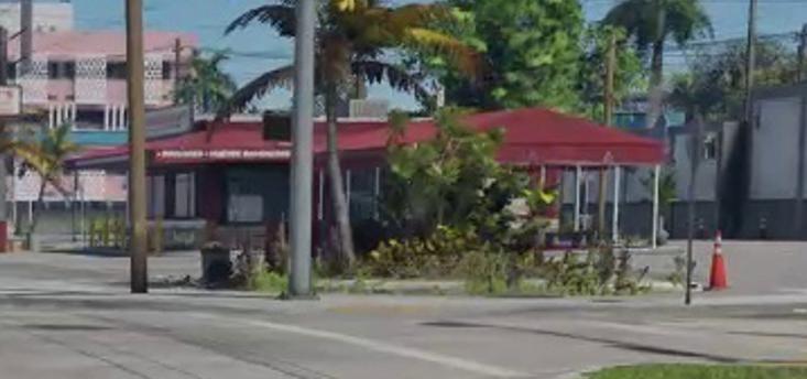 Lou's is a low roadside restaurant with a long red roofline.