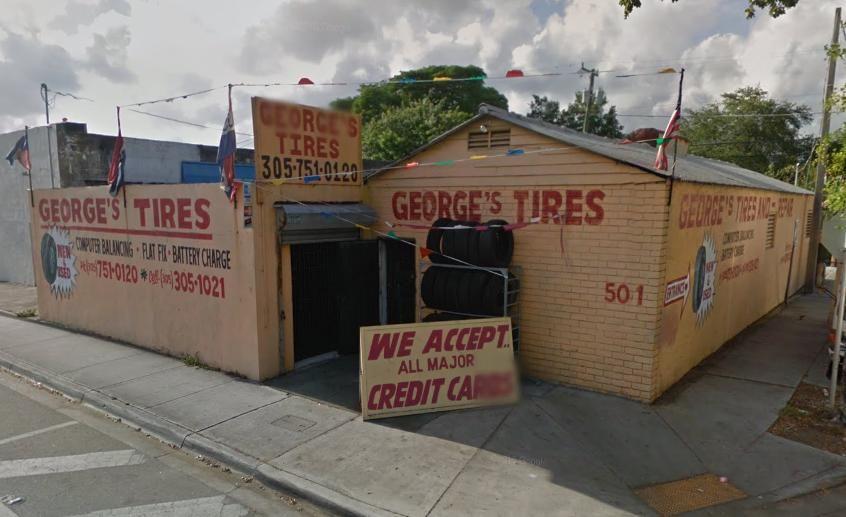 George's Tires and Repair has the same workshop layout and roadside clutter.