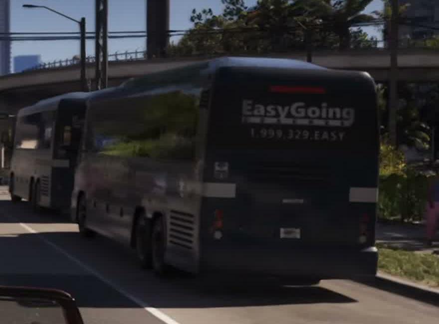 Rear three-quarter view of coaches carrying Easy Going branding in GTA VI traffic.