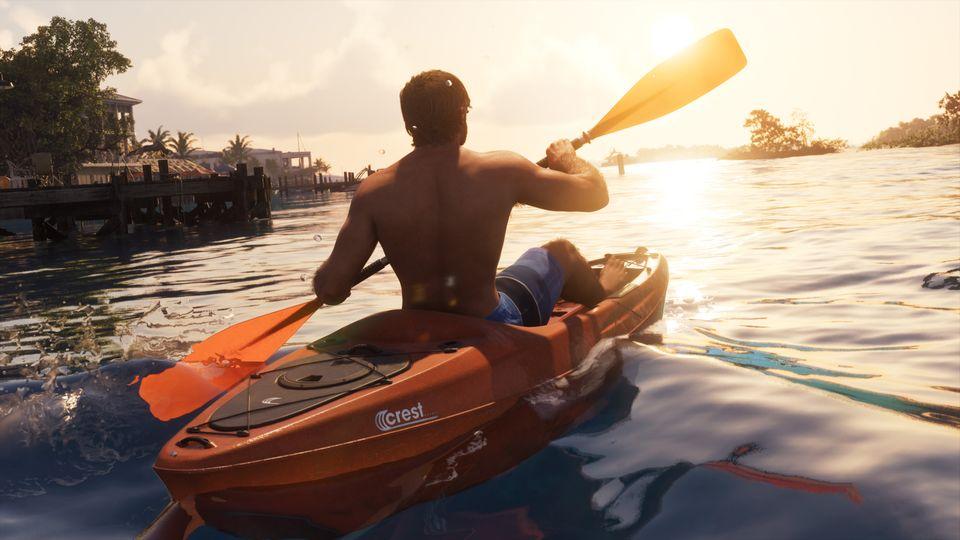 A paddler in an orange Crest Kayak near a wooden dock.