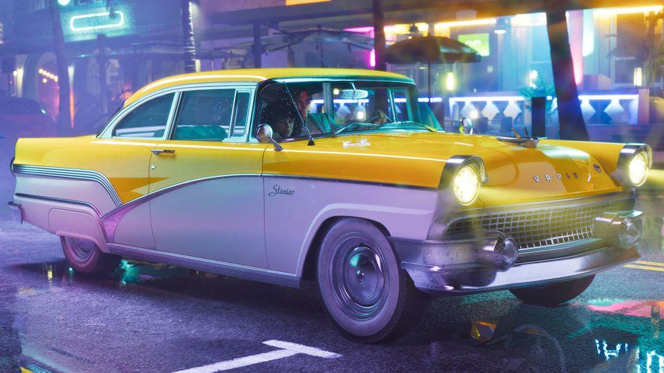 The ’55 Vapid Stanier Sedan under neon lights at night.